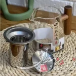 قوری پیرکس دسته چوبی(750میل)